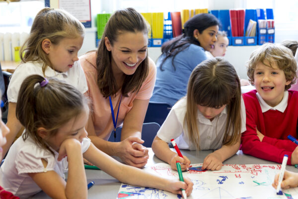 Classmates Drawing Together