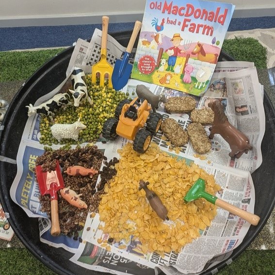 Food art of a farm with crops and farm animals